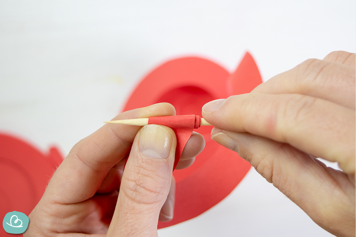 Papierstreifen aufrollen