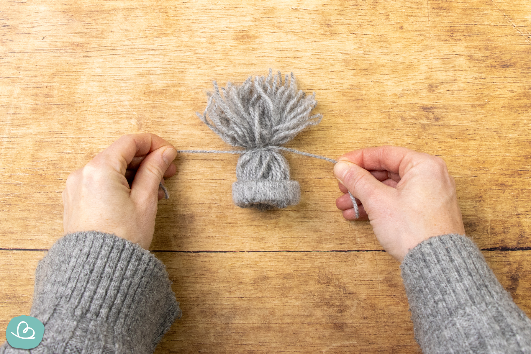 Mini Mütze aus Wolle basteln