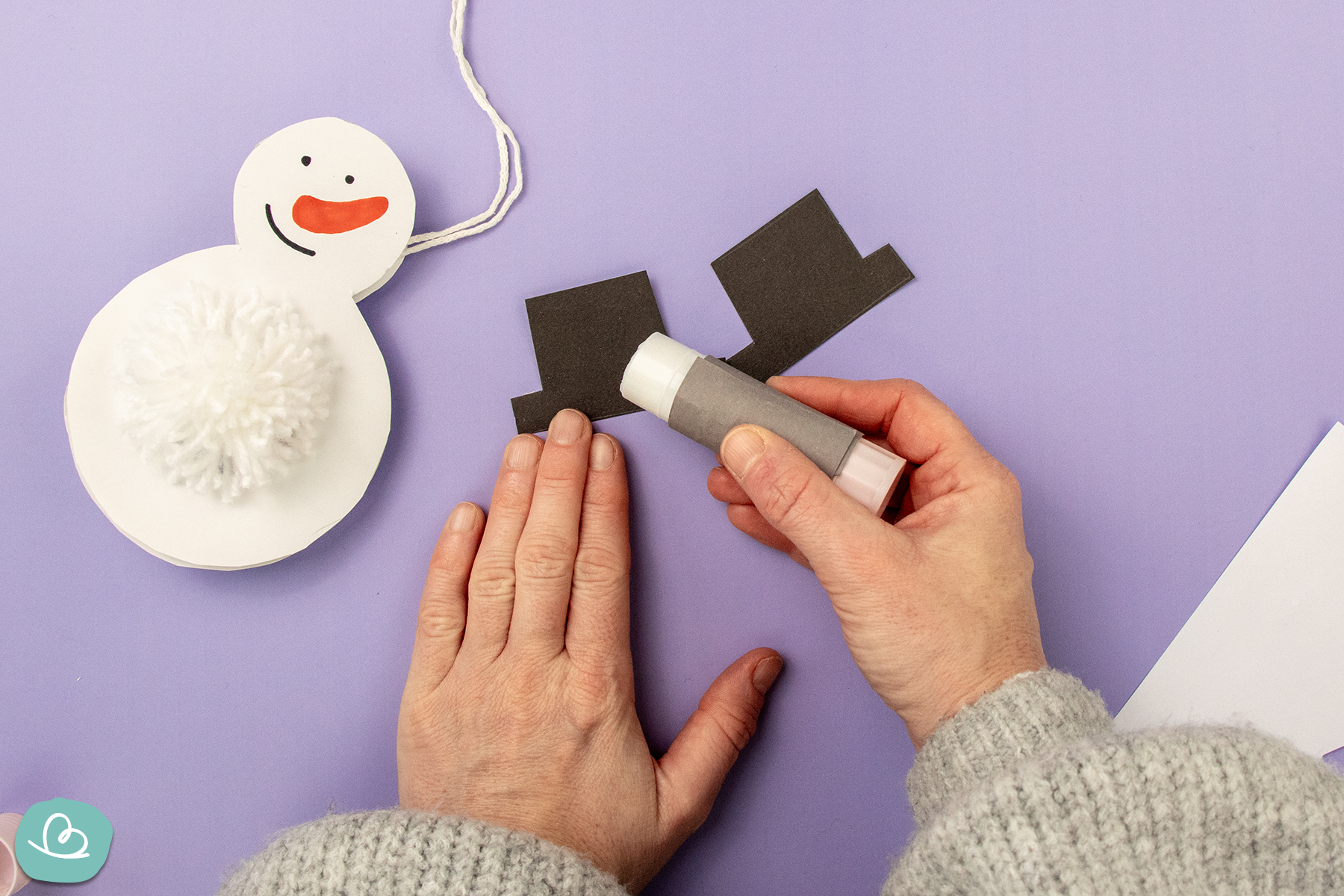 Schneemann Hut aufkleben