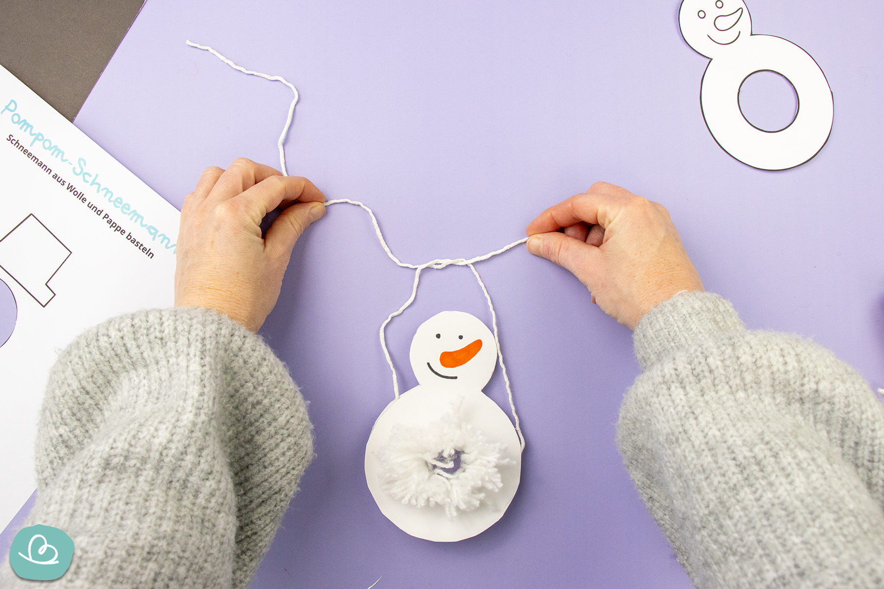 Wollfaden Schleife binden