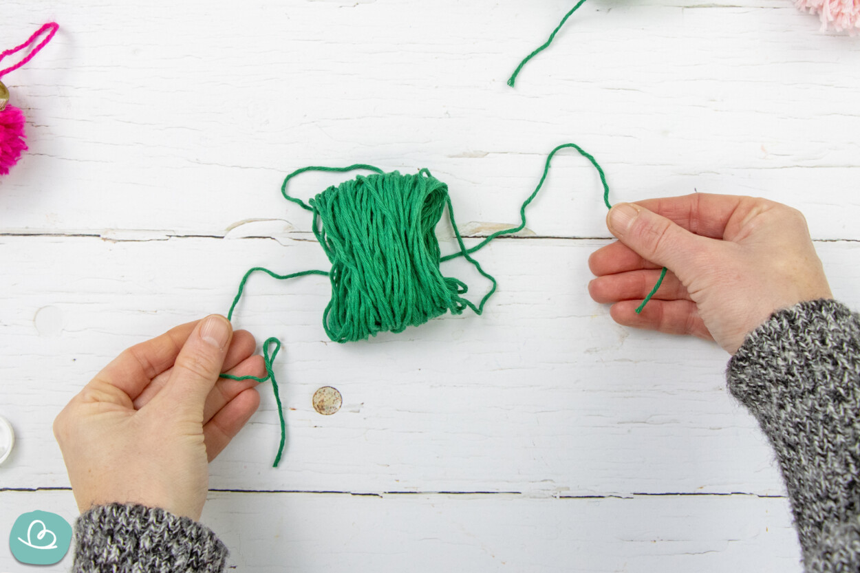 Wollknäul verknoten