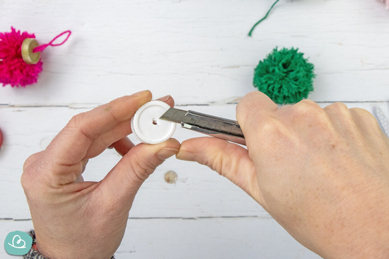 Loch in MIlchdeckel bohren